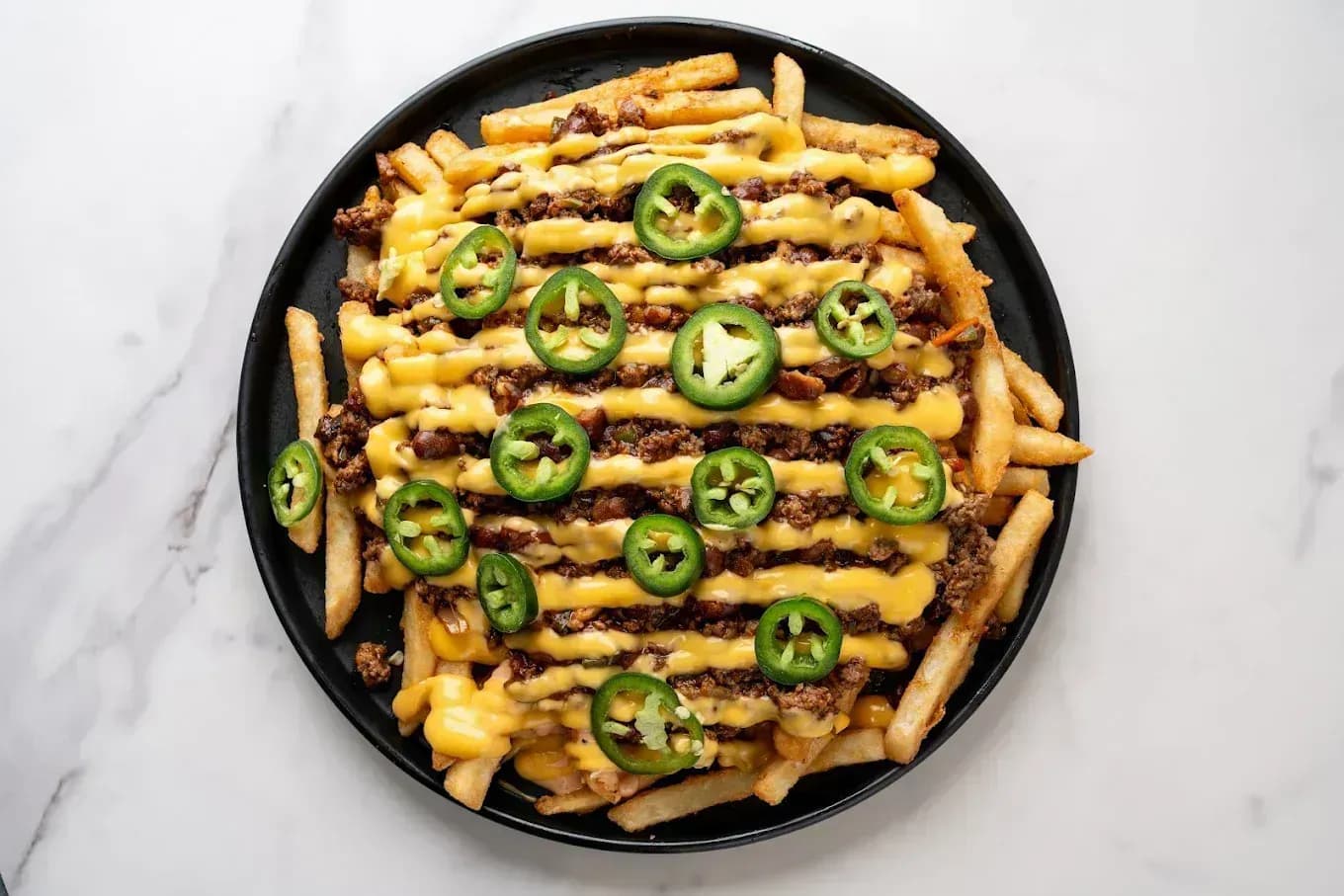 Chili Lava Fries in Houston TX - Juicy Joint