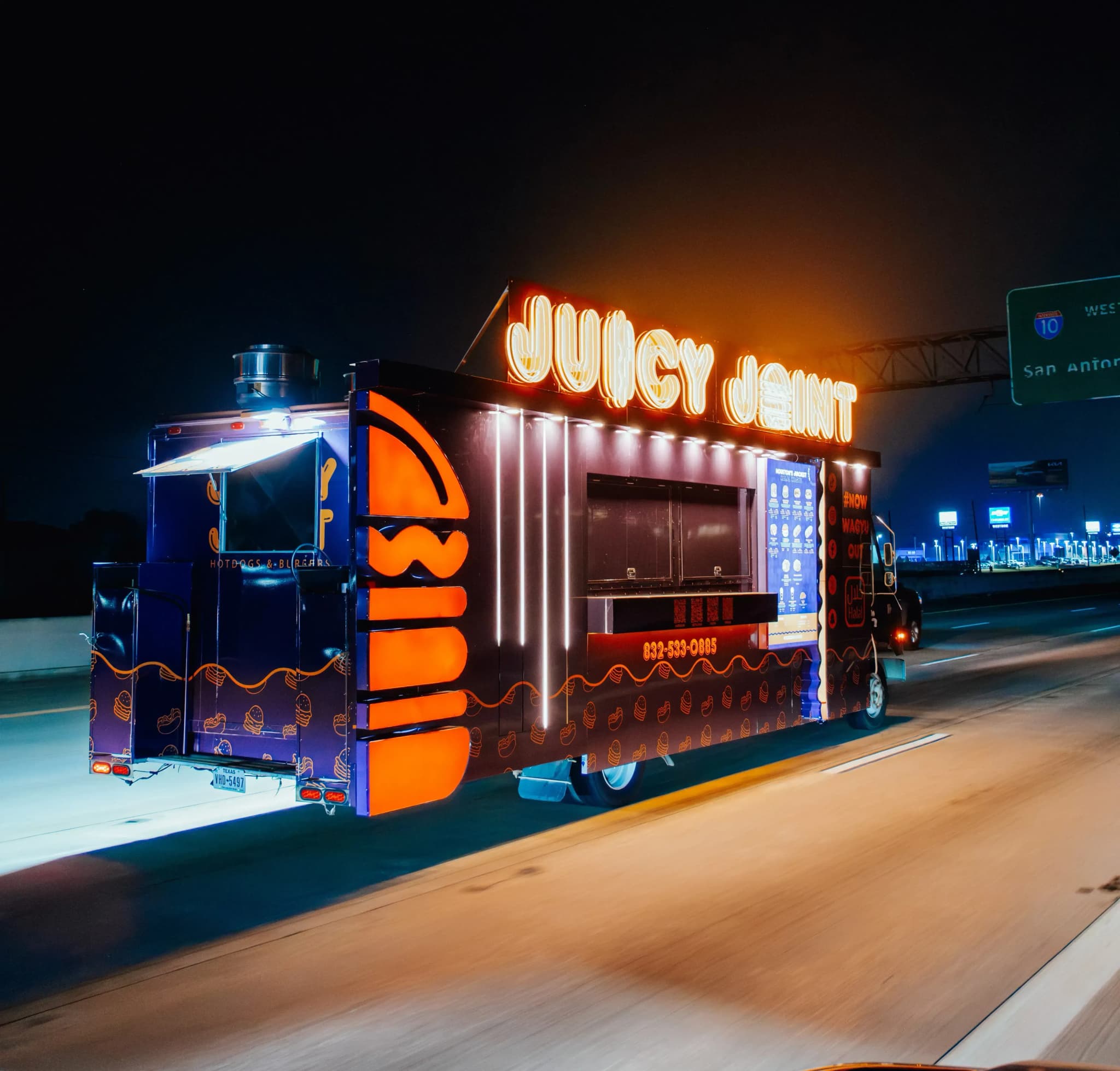 Juicy Joint food truck at night in Houston TX